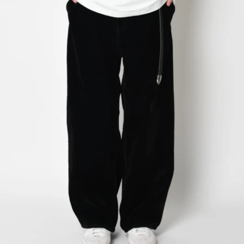 Black flocky denim barrel leg trousers