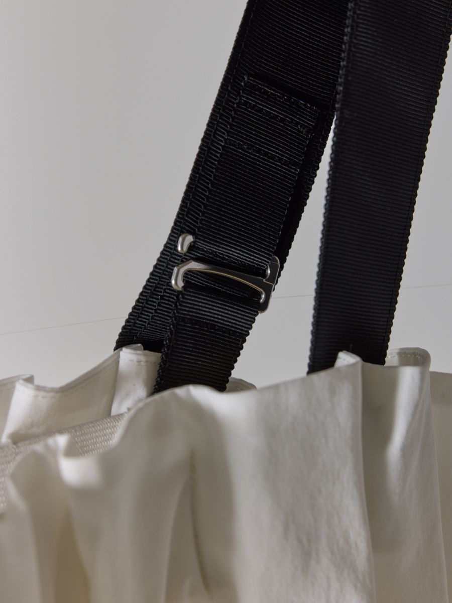 【予約販売】Mewl 撥水タックプリーツOP M262-58074