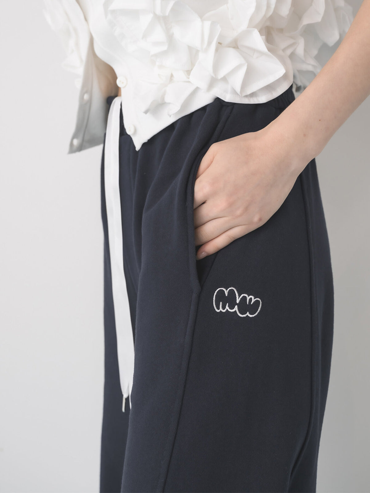 【予約販売】Mewl CURVY SWEAT PANTS M264-38193