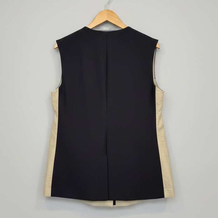 Muel Chic レイヤードデザインポケットジレ